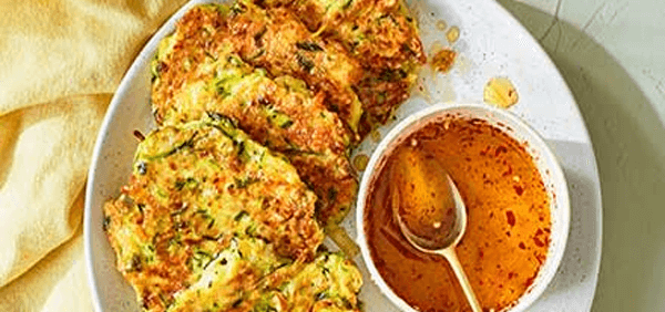 Sesame, halloumi & courgette fritters with chilli honey drizzle 