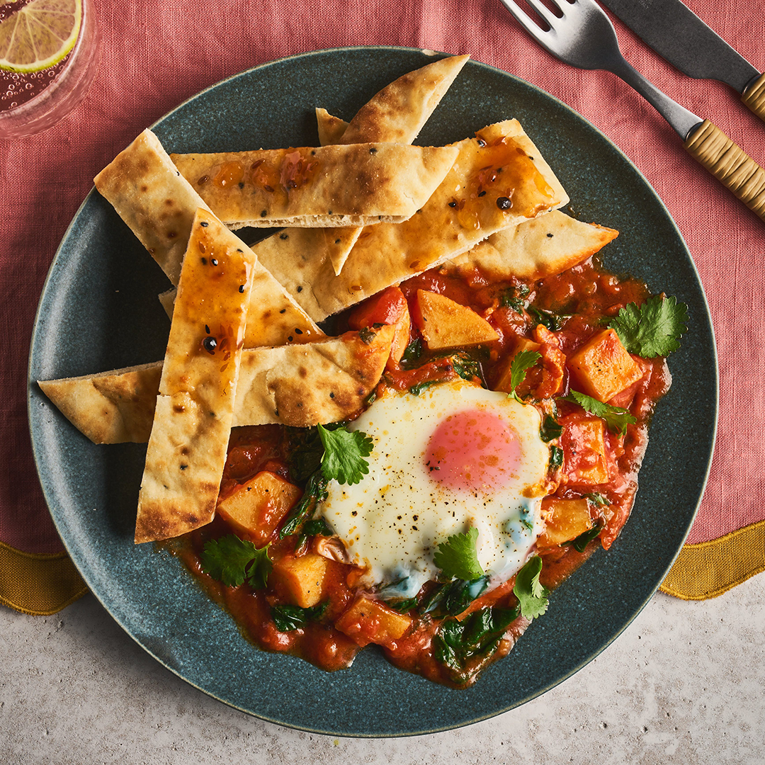 Saag baked eggs with naan dippers